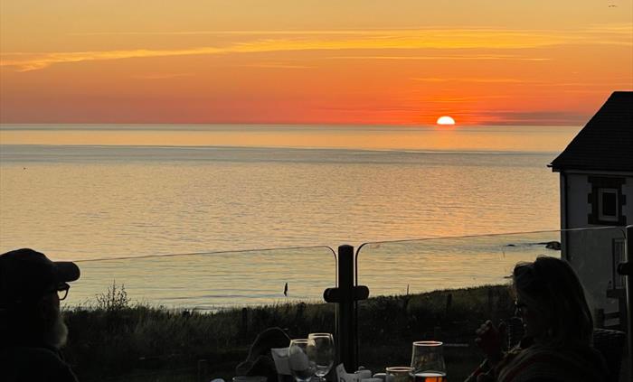 Flatrock Terrace Seating with Views of the Sea during Sunset